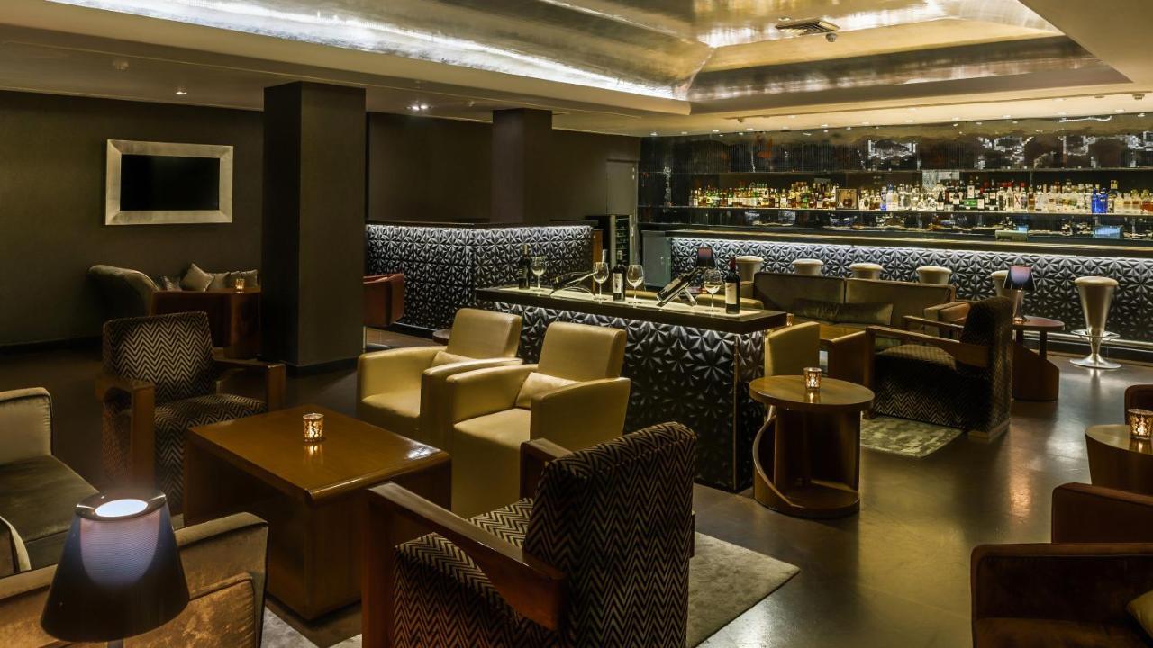 The Claridges New Delhi Hotel Exterior photo The bar at the Concourse Lounge