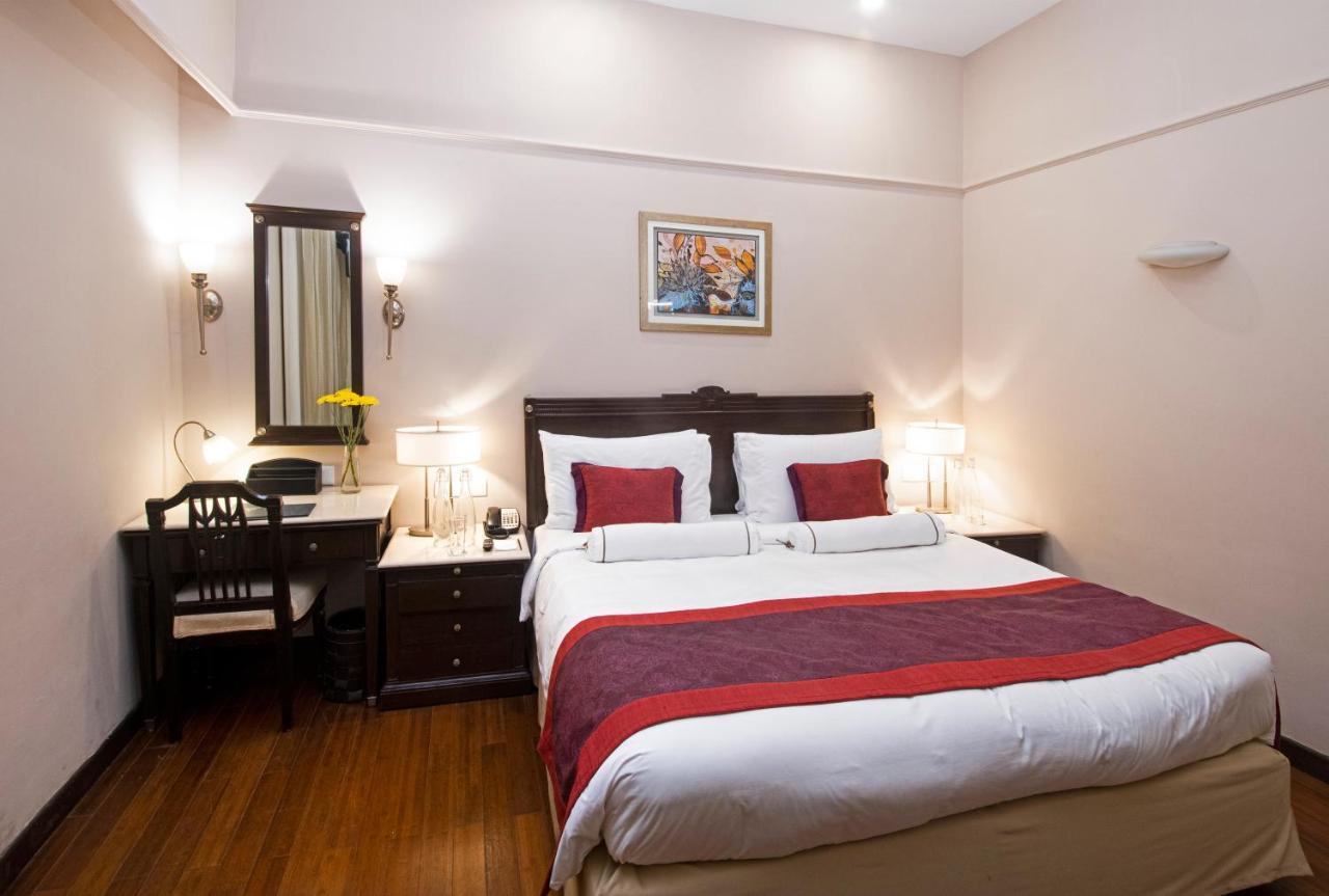 The Claridges New Delhi Hotel Exterior photo A room at the hotel