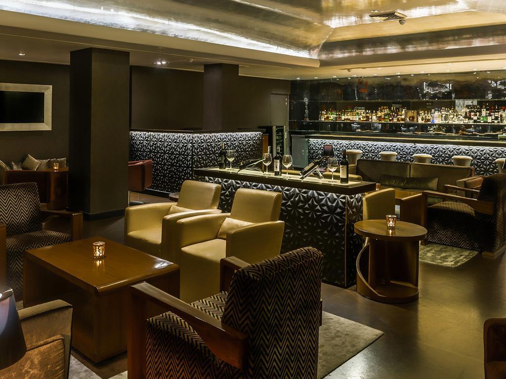 The Claridges New Delhi Hotel Exterior photo The bar at the Concourse Lounge