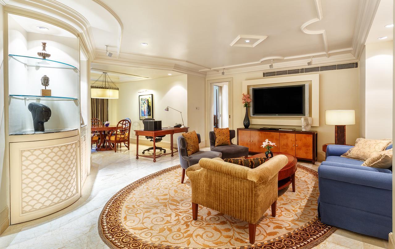 The Claridges New Delhi Hotel Exterior photo A living room in a suite at the Ritz-Carlton, Dubai